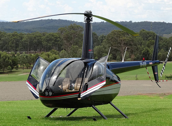 Image of helicopter about to receive passengers for a Hunter Valley Private Tour