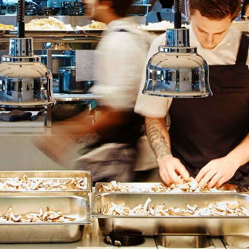 An image of the kitchen at Bennelong Restaurant on your foodie Taste of Sydney private tour