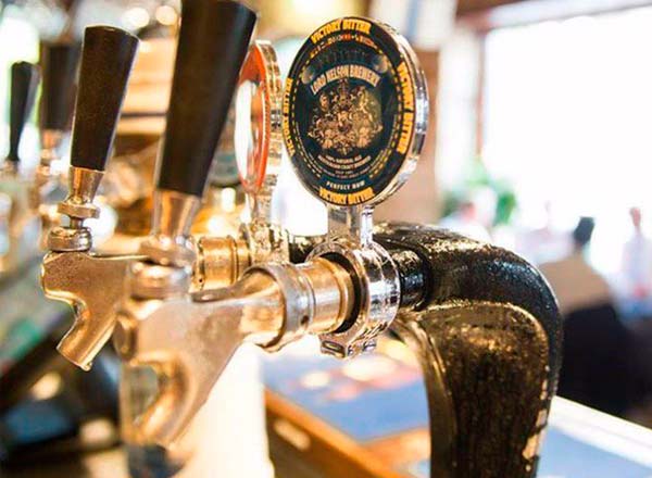 An image of Lord Nelson beer on tap at the Lord Nelson Pub and Brewery on your foodie Taste of Sydney private tour