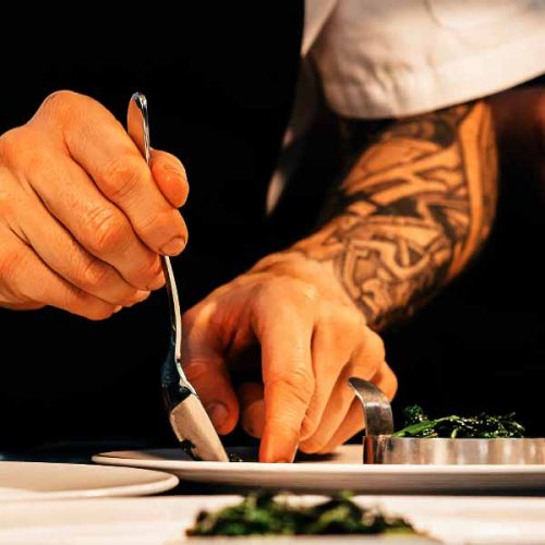 a chef plating up some fine dining