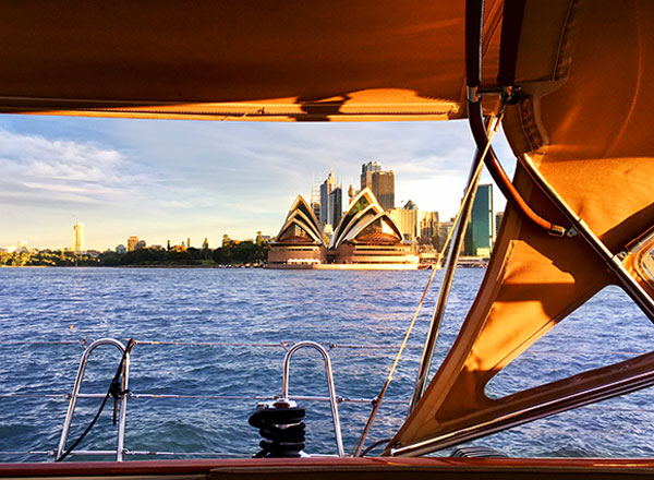 A sunset on Sydney Harbour onboard The Count during your private sunset sailing cruise experience