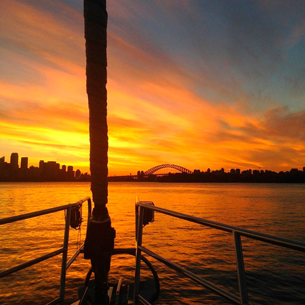 A sunset on Sydney Harbour onboard The Count during your private sunset sailing cruise experience